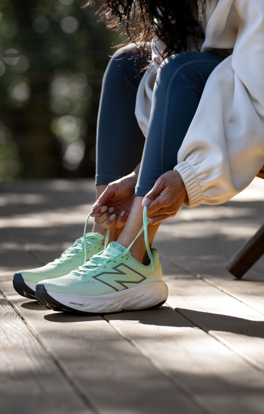A woman wearing Fresh Foam X 1080 shoes